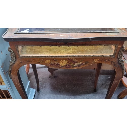 467 - Star Lot : A gorgeous 19th century vitrine table with curved legs, ormolu mounts, and elegant hand p... 