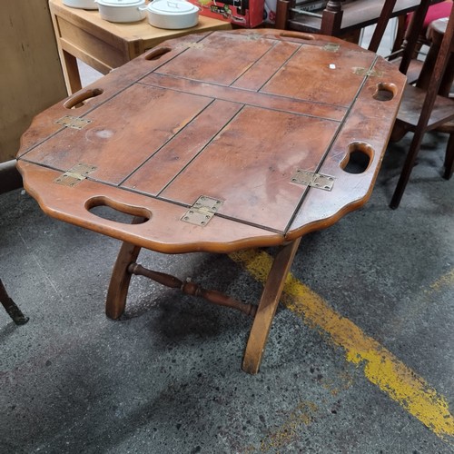 468 - Star Lot : A wonderful fold down hard wood butler's table with a removable oversized hinged tray on ... 