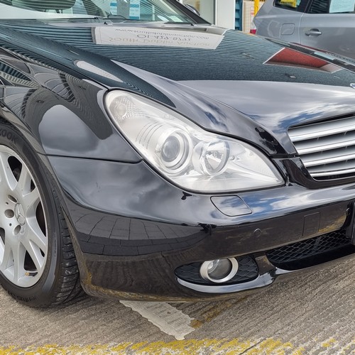 654 - Star Lot : A Motor Car. A Mercedes CLS350 Sports Coupe petrol. 2007 model. 3.5L Automatic. Black wit... 