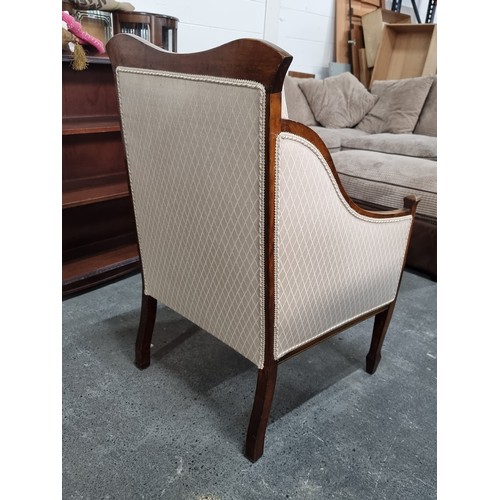 668 - Star Lot : A stylish Edwardian armchair with beautiful string inlay throughout. Elegantly shaped and... 