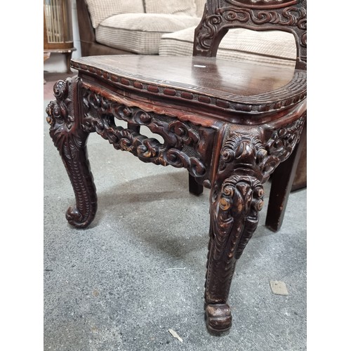 665 - Star lot : A striking pair of late 19th century Chinese carved ebonised rosewood and black lacquer p... 