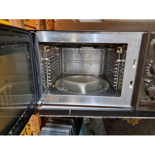 604 - A Miele M626G microwave / grill, very good brand.