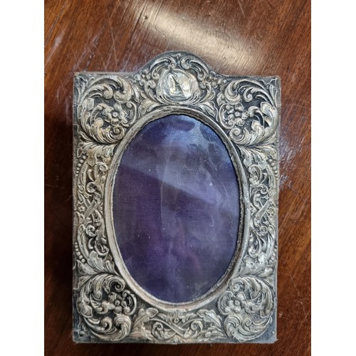 617 - A selection of six vintage items, including an antique sterling silver embossed photo frame (hallmar... 