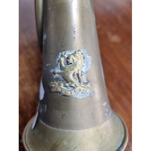 615 - A World War I British Indian Army brass bugle featuring the lion rampant badge of the Kumaon Regimen... 