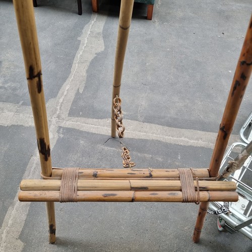 693 - Star Lot :A highly unusual full size antique easel. Hand constructed from bamboo with cane binding. ... 