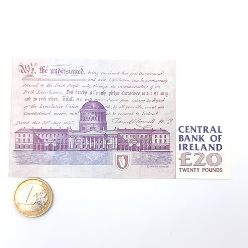 514 - An Irish series C twenty pound bank note, dated 19/12/99. In near fine condition.