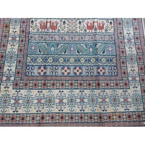 767 - Star Lot : A lovely large hand made and hand knotted low pile 100% wool floor rug with geometric des... 