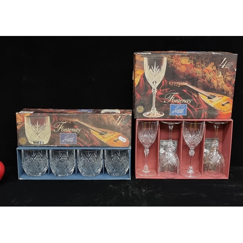 124 - A set of two boxes of Cristal D'Arques glasses in the Fontenay pattern. Comprising of four stemmed g... 