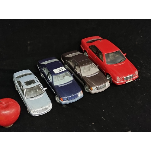 135 - A collection of four collectable model cars including a pair of Mercedes 600 SEL no. 1700 (1/24) by ... 