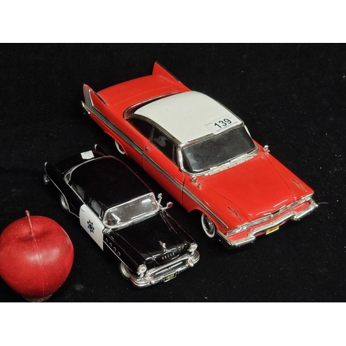 139 - Two highly collectible model cars, including a 1955 Buick Century (1/26) made by Maisto and with a C... 