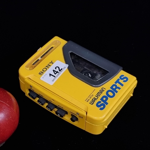 142 - A charming Sony Walkman Sports portable radio cassette player in bright yellow, model WM-AF54. Made ... 