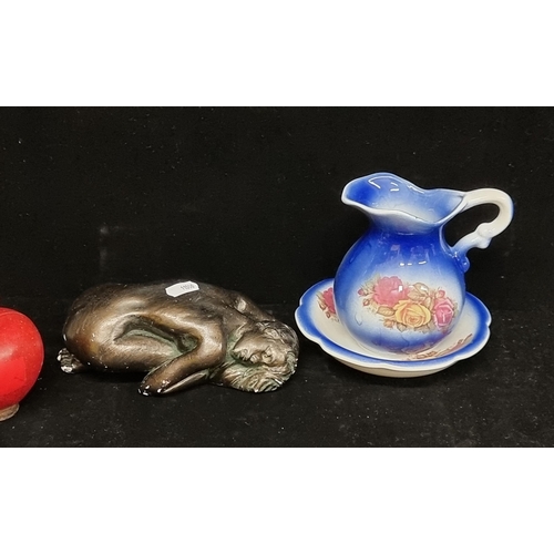 147 - Three collectible items including a charming matching pitcher jug and saucer by Ballyporeen Pottery,... 