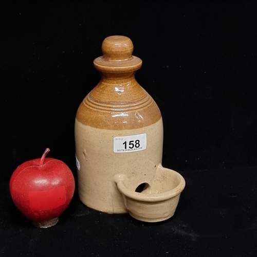 158 - An unusual antique stoneware bird waterer with brown dip glaze, in good condition.