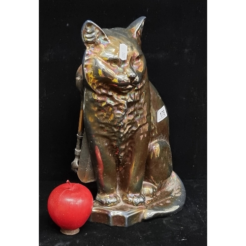 178 - An unusual vintage figurative companion stand featuring a cast metal cat with lustre finish, and a c... 