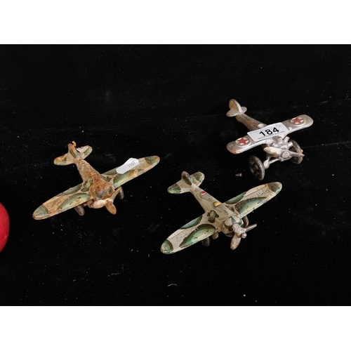 184 - A selection of three heavy cast metal model army bomber planes. With movable propellers and wheels. ... 