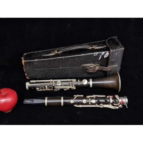 191 - A super, vintage clarinet by Hawkes & Son London, stamped 