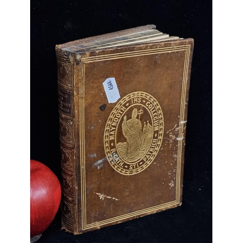 195 - A hardback antique book entitled 