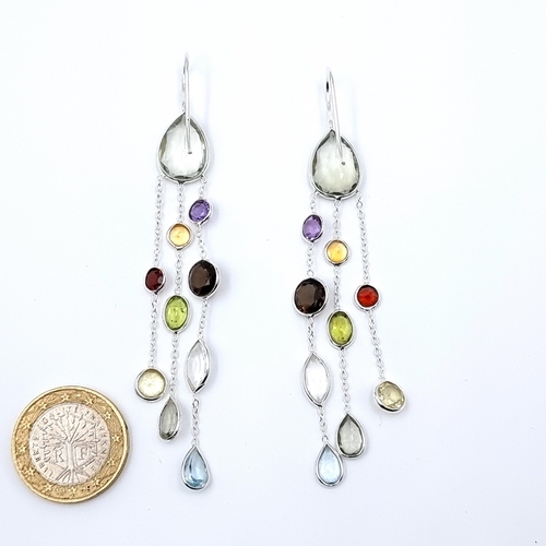 20 - A nice pair of drop earrings, featuring Moonstone, Amethyst, Citrine, Quartz and Peridot stones. Set... 