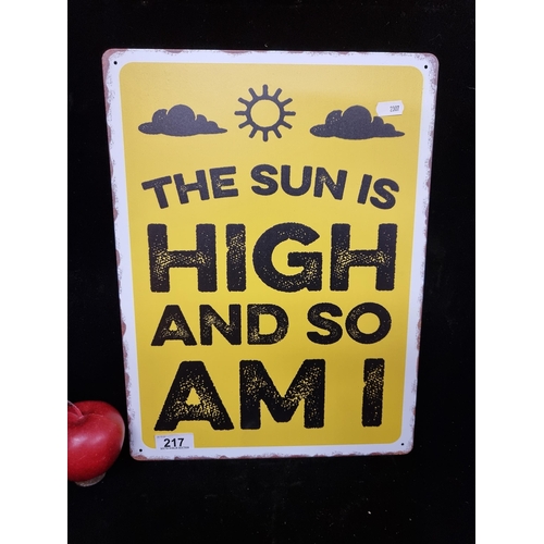 217 - A metal advertising sign featuring the text ''The Sun Is High And So Am I'' in black lettering on a ... 