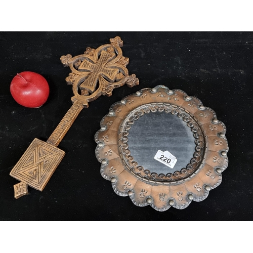 220 - A pair of interesting vintage collectable items including a hammered metal mirror with scalloped edg... 