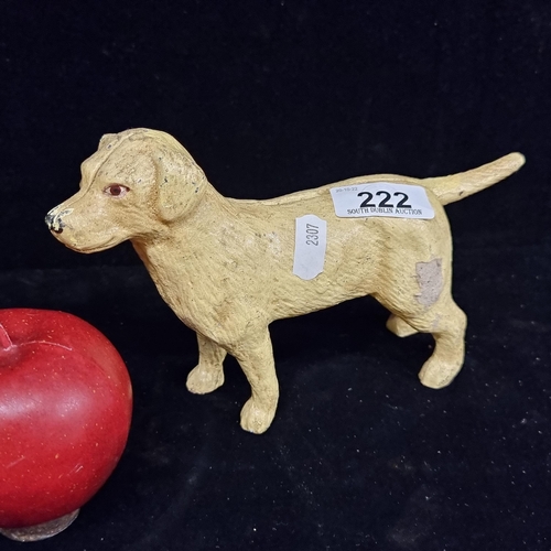 222 - A cast metal golden retriever dog figure. A heavy example, hand painted.