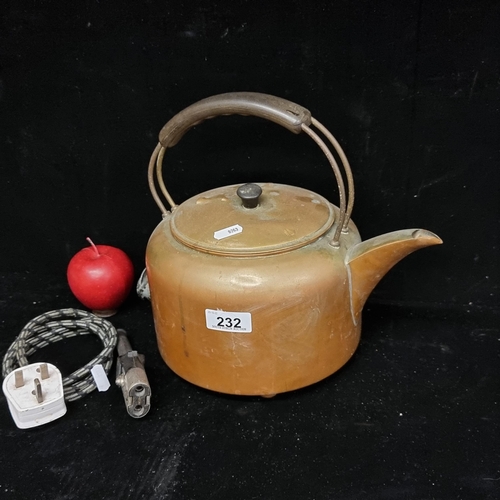 232 - A lovely large copper kettle with removable electrical cable.