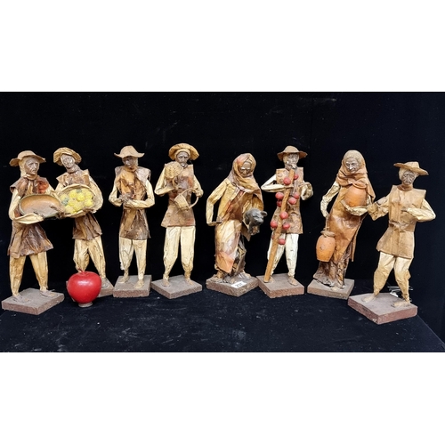 237 - A fantastic collection of eight traditional Mexican paper mache figures. These folk art pieces depic... 