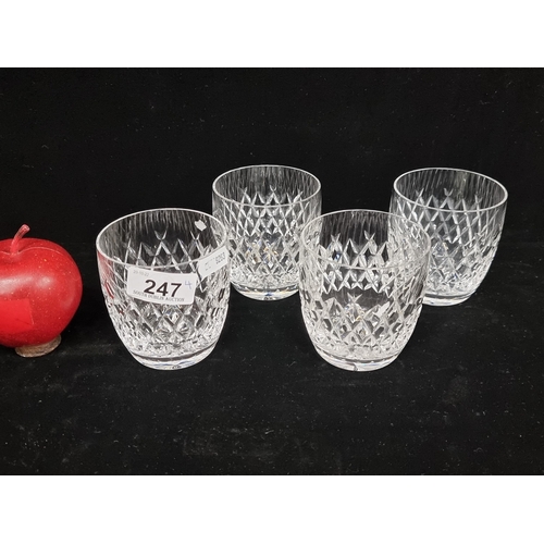 247 - Set of four whiskey tumblers by Waterford crystal. Featuring the Boyne pattern comprising of a thick... 