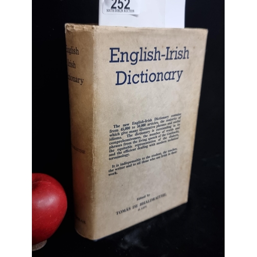 252 - A vintage hardback English - Irish dictionary by Thomás de Bhaldraithe (1959). With original dust ja... 