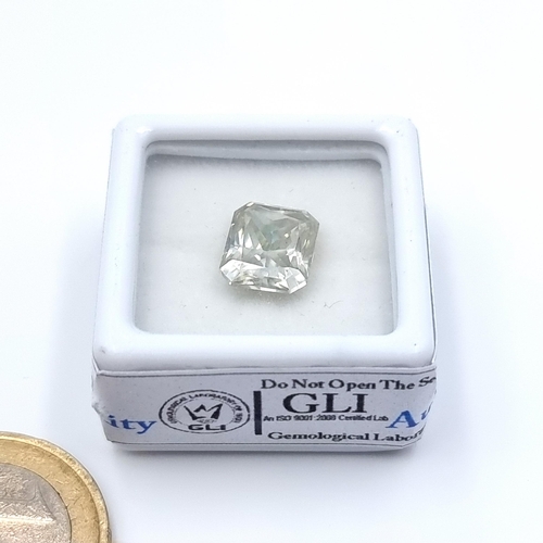 3 - A beautifully bright fine Moissanite stone, of rectangular cut of 3.58 carats. Masonite stones have ... 