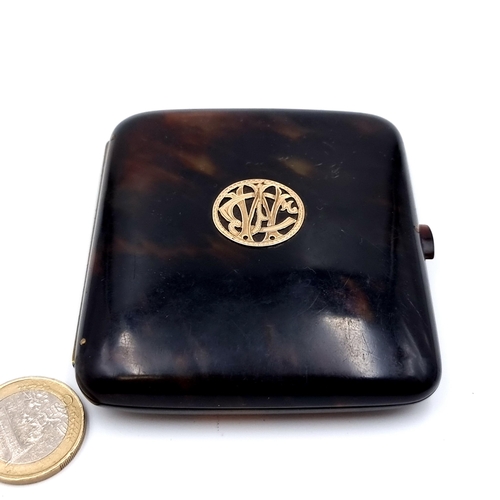 521 - A lovely tortoise  shell cigarette case, with an inlayed 9ct Gold Cypher. Nice, clean example with n... 