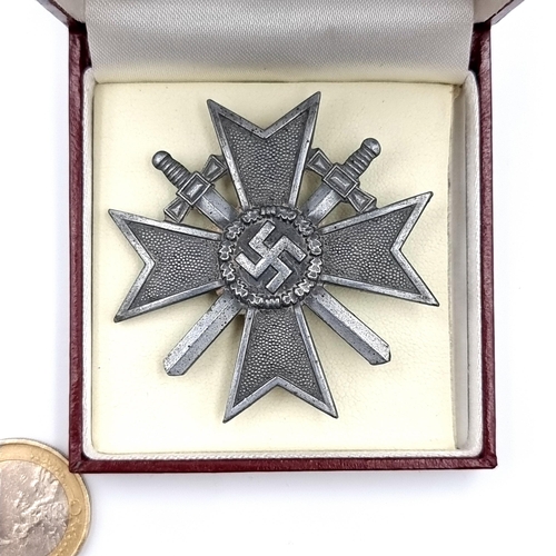 523 - An original WWII German Iron Cross pin badge, of the first class. Pin intact.