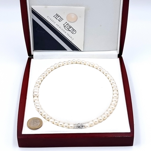 55 - A beautiful example of a single strand row Fresh Water Pearl necklace. These are the classic heirloo... 
