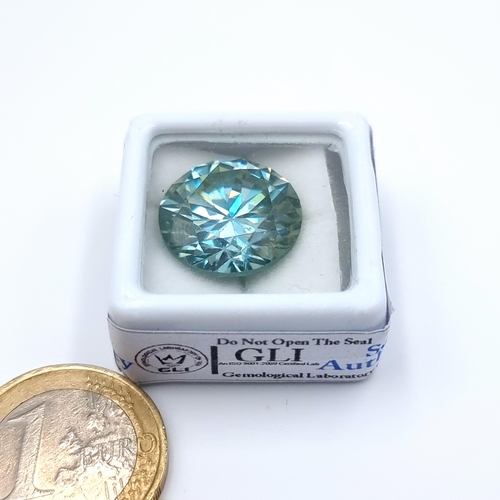 6 - An impressively huge Blue Moissanite brilliant round cut stone, of 16.370 carats. These stones have ... 
