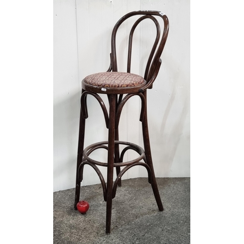 A lovely vintage bentwood high stool with a padded seat upholstered in a floral fabric.