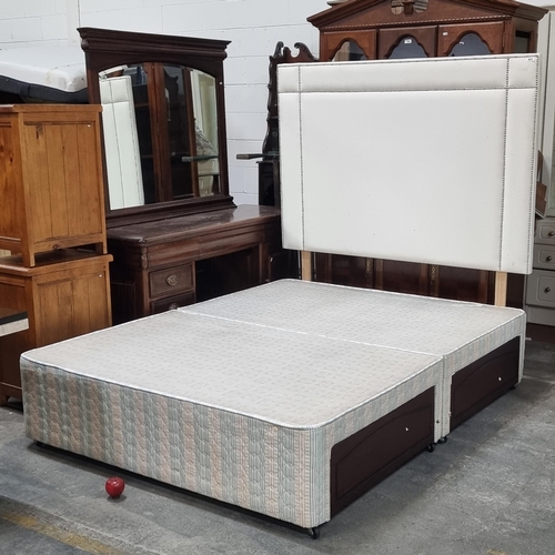 803 - A very grand king sized bed made by Sealy with high headboard upholstered in a cream fabric with stu... 