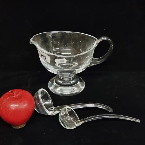 197 - A hand blown glass gravy / sauce boat. With two hand blown mini ladles.