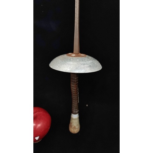 324 - A Leon Paul fencing foil (sword) with leather wrapped, shaped handle.