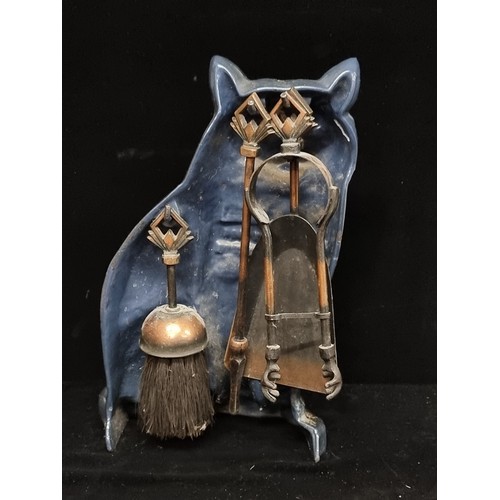 178 - An unusual vintage figurative companion stand featuring a cast metal cat with lustre finish, and a c... 