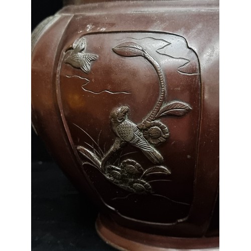 132 - Star lot : A fabulous 19th century  Chinese bronze urn with relief vignettes of swallows bordered by... 