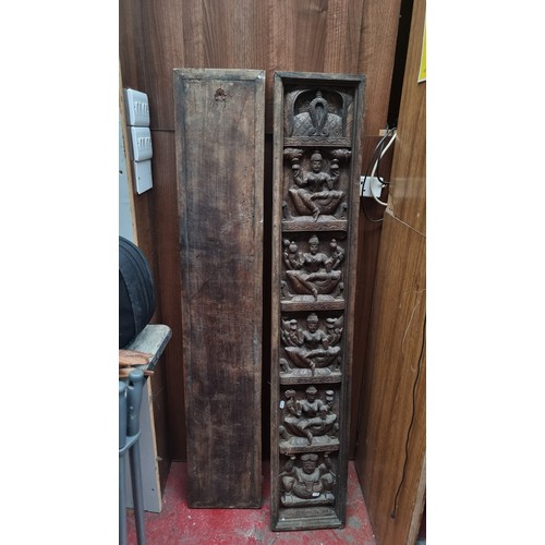 312 - Star lot : A pair of early 20th Century, Indian, hand-carved oak panels depicting Hindu iconography ... 