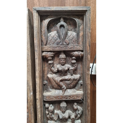 312 - Star lot : A pair of early 20th Century, Indian, hand-carved oak panels depicting Hindu iconography ... 