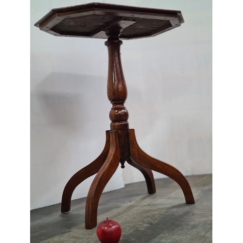 381 - A charming Edwardian wine table with an octagonal top, quadroped base and string inlay. This his a l... 