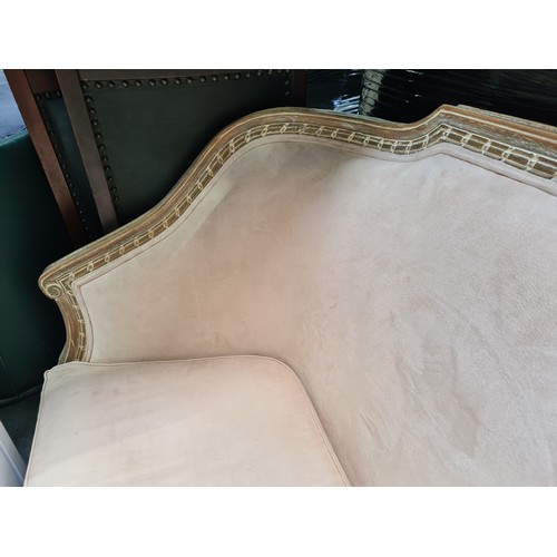 383 - Star lot : A gorgeous two seater love seat with a whitewashed wooden frame and soft cream suede upho... 