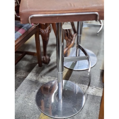 639 - Two designer very heavy mid century bar stools made in Italy by designer Fram with chrome adjustable... 