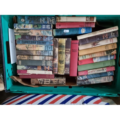 714 - A collection of five boxes filled with books, including vintage hardcover books such as 