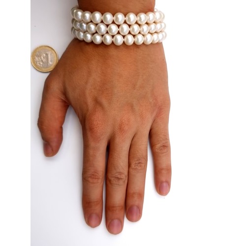 56 - A very attractive quality three row Fresh Wate Pearl bracelet, by Heirloom Pearls. This example is A... 