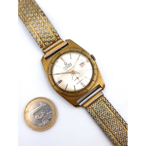 143 - Star lot : A Vintage Gents Omega Lings calendar watch, Swiss made. The watch winds and ticks and the... 