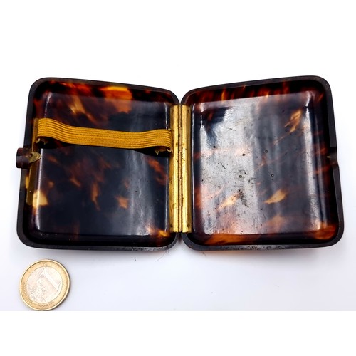 521 - A lovely tortoise  shell cigarette case, with an inlayed 9ct Gold Cypher. Nice, clean example with n... 