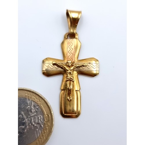 535 - A fine example of a charming antique  18ct Gold crucifix pendant cross. Weight of cross: 4.15 grams.